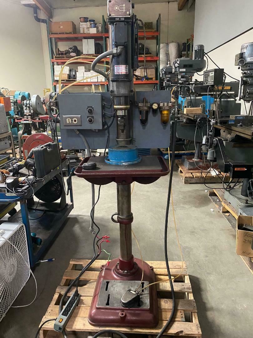Drill press pneumatic power feed