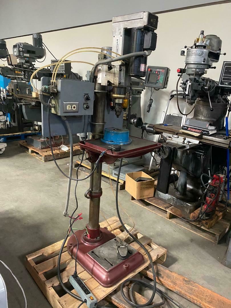 Drill press pneumatic power feed